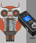 Owl design beside Chromatic Guitar Tuner Pedal With Ultra Fast Highly Accurate Tuning And 1 Cent Precision Pitch Indicator True Bypass For Electric Guitar And Bass Simple Tuner And Bypass Modes Stage Ready For Studio Sessions, showcasing detailed craftsmanship and digital display