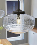 Saddle Creek 1 Light Noble Bronze Pendant With Seeded Glass Shade Dimmable Schoolhouse Ceiling Fixture in kitchen
