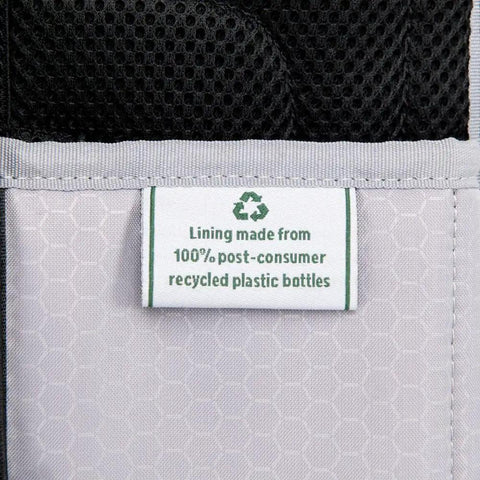 Close-up label showing eco-friendly lining on Softside Underseat Carry On Bag With Wheels Lightweight 15-Inch Luggage For Travel Compact Upright