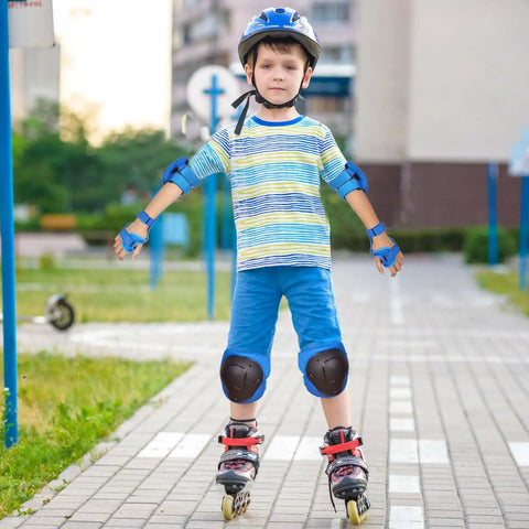 Child wearing All In One Kids Protective Gear Set 6 In 1 Knee Pads Elbow Pads Wrist Guards For Ages 3 To 14 Boys Girls Adjustable
