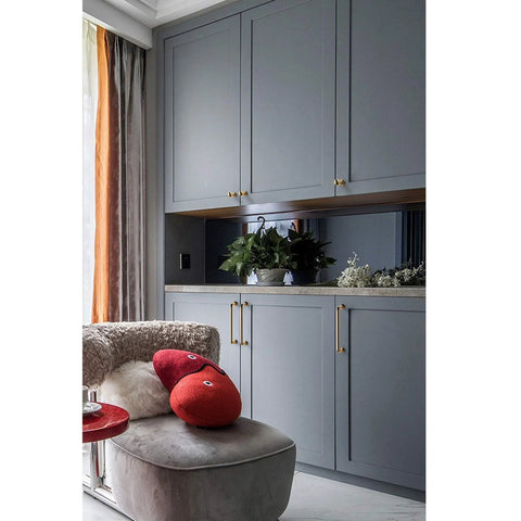 10 Pack Polished Brass Cabinet Pulls installed on gray kitchen cabinets for modern look and easy use