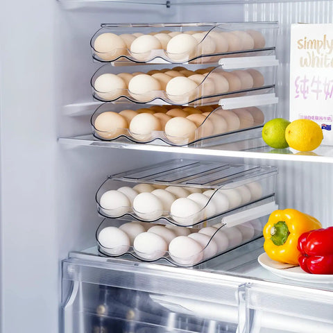Two Layer Ramp Type Auto Rolling Egg Holder For Fridge Organizer Large Clear Egg Bin Stackable Egg Storage Tray With Front Load Roll Forward Design For Easy Access Daily Use shown organizing eggs in a fridge