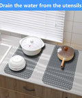Pro Grade Silicone Sink Mat Grid For Kitchen Sink Protection Fits 12 Inch To 30 Inch Flexible And Heat Resistant Non Slip Odor Resistant Shields Glassware And Dishes In Stainless Steel And Farmhouse Sinks Easy Clean Durable Kitchen Mat with pots and pan