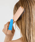 One Hundred Piece Bundle Of Blue Antistatic Finger Sleeves Breathable Nitrile Digit Protectors For Cleanroom Electronics And Heavy Duty Hustle Slick Wear Resistant All Day Shield used while brushing hair.
