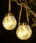 2 Pack Solar Lanterns With 30 LED Waterproof Garden Lights For Outdoor Decor Patio Hanging, Warm White Glow in tree at night