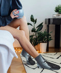 Woman wearing Death Scythe Ankle Socks For Women Low Cut No Show Moisture Wicking Cushioned Athletic Socks with arch support at home.