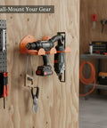 Orange Wall Mounted Tool Rack For Power Tools And Garden Gear Compact Garage Organizer holding drills and saws on a wall.