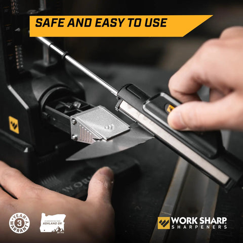 Hand using Pro Grade Precision Adjustable Knife Sharpener With 7 Abrasives Including Diamond And Ceramic Leather Strop Beefed Up 15 To 30 Degree Angles Built For Hunting Serrated And Kitchen Knives, close-up view.