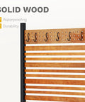 72 Inch Outdoor Privacy Fence Panel With Planter Box And Trellis For Backyard And Patio Privacy Brown Natural Wood With Classic Grain Hides Trash Cans And AC Units One Panel For A Yard Upgrade With A Cool Outdoor Screen showing close-up of wood slats and metal hooks