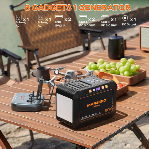 Portable Solar Generator 111Wh Power Station With 30W Solar Panel Included For Camping Outdoor Adventures Off Grid Power Emergency Backup With 120W Surge AC Outlet on table with gadgets