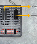 Heavy Duty Tactical Molle Panel For Tesla Cybertruck Modular Rear Cargo Organizer System With Upgraded Rigid Abs Polymer Build showing webbing and back splint.