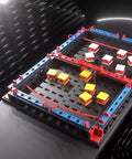 Slide Battle Building Kit With 102 Components For Big Kids And Adults Who Love To Build And Create, Ages 7 And Up, A Smart Expansion For Your Build Your Own Game Set, Perfect For Get Your Game On Competitive Play And Brain Boosting Fun. assembled plastic game board with red, blue, yellow pieces