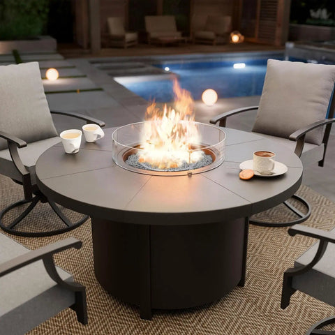 48 Inch Round Propane Fire Pit Tabletop Outdoor Heater With Auto Ignition 55000 BTU CSA Certified in patio setting with chairs