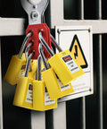 10 Pack Lockout Tagout Locks With Unique Keys Per Lock Yellow Padlocks For Lockout Tagout Stations And Devices installed on a gate