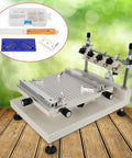 Manual Solder Paste Printer for PCB SMT Stencil Printing, adjustable height 300x400mm work area, displayed on wooden surface