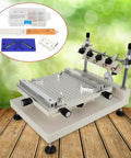Workhorse Solder Paste Printer for SMT PCB Stencil with adjustable height, honeycomb platform and toolkit on wood surface