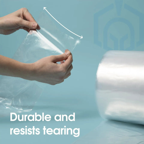 Hands holding 12 Inch Wide By 800 Feet Clear Polyethylene Tubing Roll 2.1 Mil Thick Heavy Duty Plastic Wrap for Shipping.