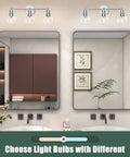 Three Light Chrome Vanity Light Fixture For Bathroom Over Mirror installed above double mirrors with sinks