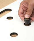 Heavy Duty Multi Functional Table Routing Jig Made For Mft Style Worktops And Plunge Router Setups display of index pin being inserted into jig.