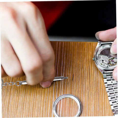 Person using 1000 Pcs Sunglasses Repair Screws Kit With Storage Case For Eyeglasses Watches And Jewelry Compact Grab And Go Tool Set For Quick Repairs And Easy Maintenance to fix a watch