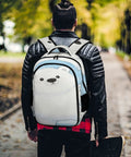 Person wearing Snowflake Cub Printed Unisex Backpack with large capacity for school work or travel, durable polyester daypack