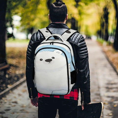 Person wearing Snowflake Cub Printed Unisex Backpack with large capacity for school work or travel, durable polyester daypack