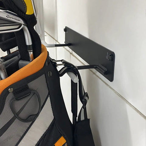 2 Pack Golf Bag Wall Mount Rack For Garage Heavy Duty Golf Storage Organizer holding a golf bag with clubs