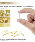 Hand holding brass standoff from All In One Pro Grade M2 Brass Standoffs Kit 320 Pc Set with hex spacers, screws, nuts.