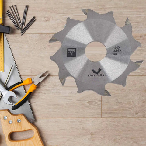 4 Inch 6 Tooth Carbide Biscuit Joiner Blade With 22mm Bore Replacement Plate on wooden table with tools