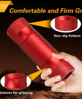 Hand holding the upgraded 40mm and 44mm wheel bearing greaser tool with storage tube for UTV, showing non-slip grip details.