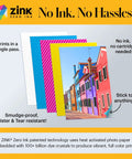 Colorful ZINK photo papers with a printed vibrant street photo, promoting features of ZINK Zero Ink technology.
