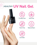 Hands holding gel nail polish from Gel Nail Polish Kit With UV Light For At Home Manicure, cruelty-free and toxin-free features.