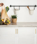 Rock Solid Champagne Gold Square Cabinet Handles 30 Pack Heavy Duty Kitchen Drawer Pulls on modern white cabinets with decor.