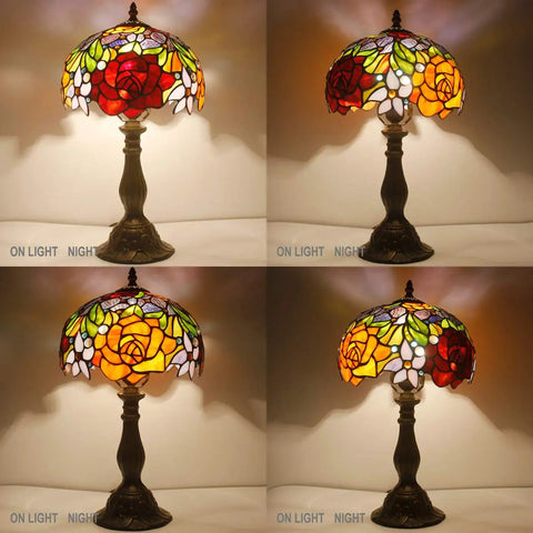 Tiffany Style Stained Glass Table Lamp With Red Rose Shade shown lit, 18-inch tall, antique green bronze finish base, UL Listed.