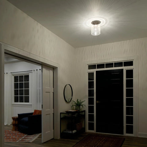 Winslow 8.5 Inch Brushed Nickel Semi Flush Mount Light With Clear Seeded Glass illuminating hallway at night