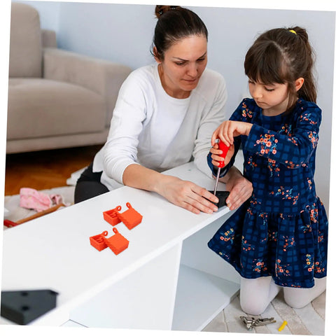 Mother and child using tools alongside Four Pack Ratchet Band Clamp Blocks for woodworking on a DIY furniture project