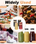 Top Shelf PVC Heat Shrink Bottle Caps Gold 30X60mm Size 50 Pack displayed with wine bottles and drinks at a festive table.