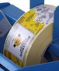 Semi Automatic Label Applicator Machine For Round Plastic Glass Bottles And Jars Featuring Ultrasonic Sensor and Adjustable Dual Mode Operation For No Sweat Labeling, close-up view of label roll.