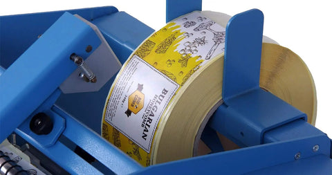 Semi Automatic Label Applicator Machine For Round Plastic Glass Bottles And Jars Featuring Ultrasonic Sensor and Adjustable Dual Mode Operation For No Sweat Labeling, close-up view of label roll.