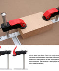 Heavy Duty Stainless Steel Hold Down Clamps For Woodworking Benchtop Setup with Quick Release Mechanism securing a wooden block.
