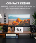 M60 Desktop Bluetooth Speaker System That Cranks Out 66W RMS, Hi Fi Audio beside a desk monitor with flowers