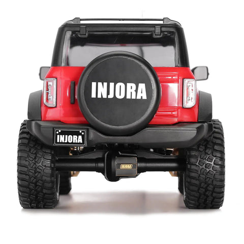 Rear view of TRX4M 1/18 crawler with Brass Front And Rear Axle Diff Covers With Black Hard Coating, showing axle details.