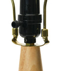 Natural Wood And Black Ceramic Table Lamp base close-up, showing rotary switch and natural wood texture