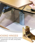Real-Deal Heavy Duty Foldable Iron Hinges With Self Locking Mechanism installed under a brown table corner for workbenches.