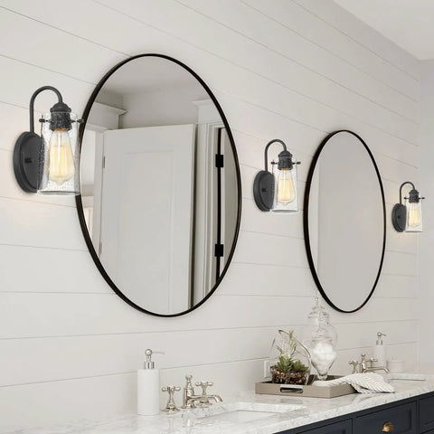 Bathroom with Rayne 9.5 Inch Modern Farmhouse Wall Sconce Black Gooseneck Light With Tapered Seeded Glass Shade over vanity