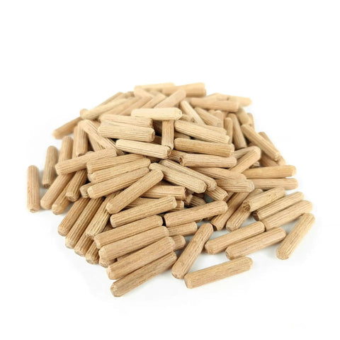 Heavy Duty Fluted Wooden Dowel Pins 100 Piece Set With Smooth Beveled Tips for zero drama woodworking joints stacked in a pile.