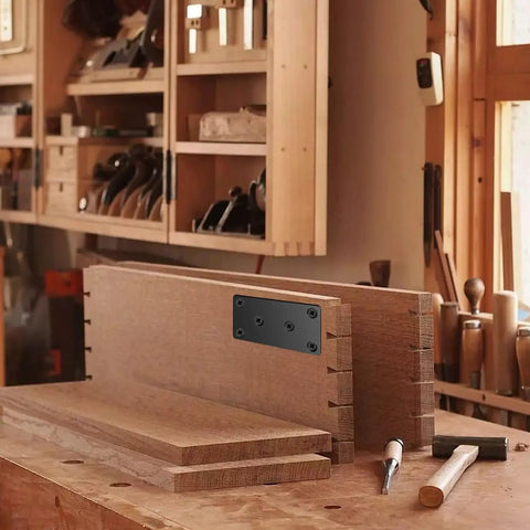 Heavy Duty Black Flat Metal Brackets For Wood Repair Set With Included Screws on wooden boards in workshop.