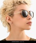 Profile view wearing Marshal II Geometric Aviator Sunglasses With Gold Frame And G15 Green Lenses, 52MM, unisex style.