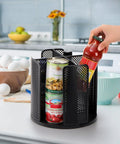 Two Pack Rotating Cup Dispenser With Four Compartments For Cups And Lids in black, used as kitchen countertop organizer with cans.