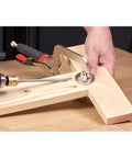 Rock Solid Pocket Hole Jig Face Clamp For Seamless Frame Joinery featuring adjustable pressure on flat wood pieces.